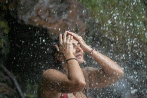water splashing on woman
