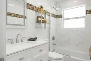 white ceramic sink beside the white toilet