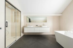 bathtub and shower cabin in contemporary bathroom