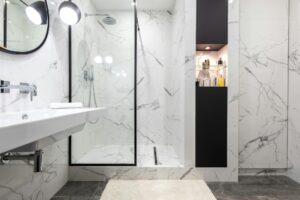 contemporary bathroom interior with shower cabin and washstand at home