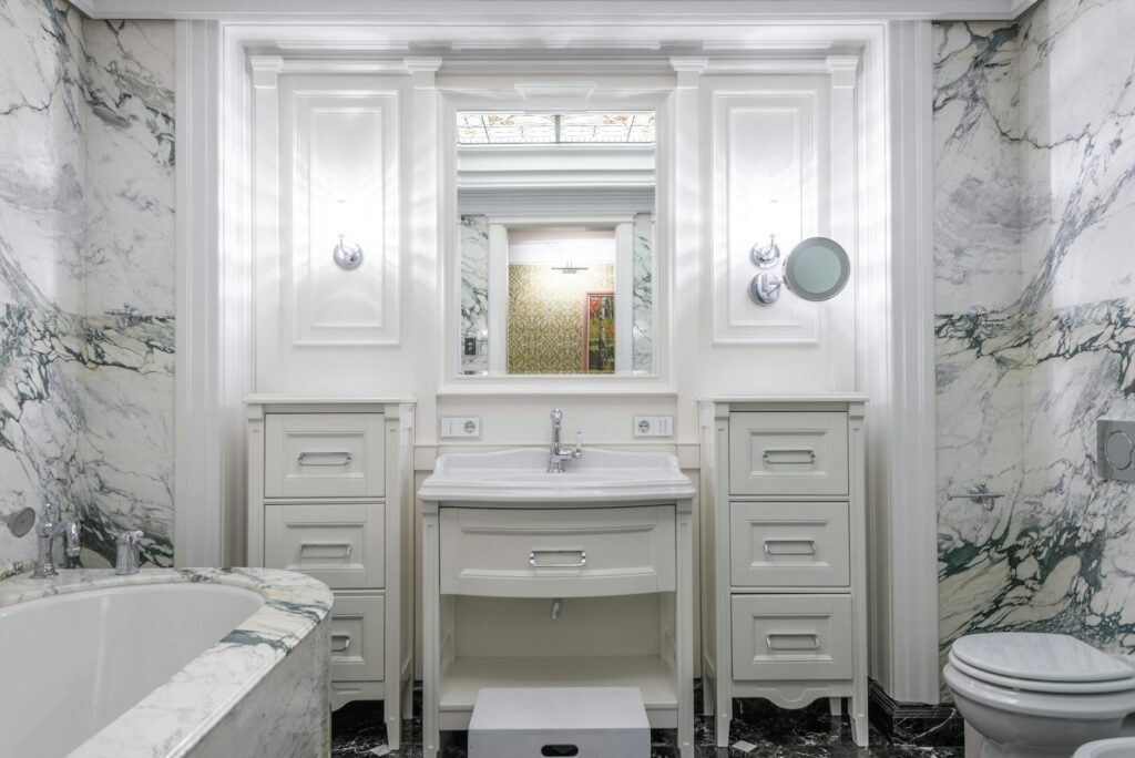 a modern bathroom with marble wall
