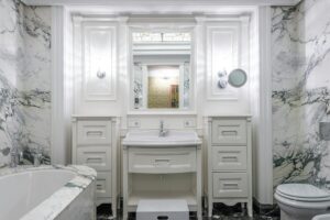 a modern bathroom with marble wall